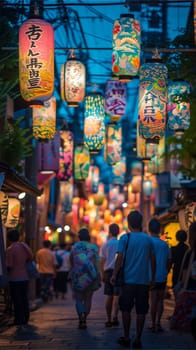 Multiple individuals walking along a street illuminated by hanging lanterns.