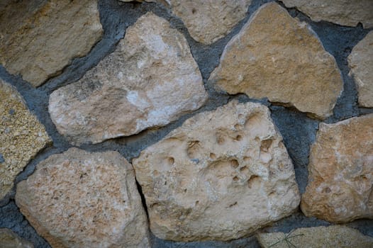 Wall of stones as a texture for background 2