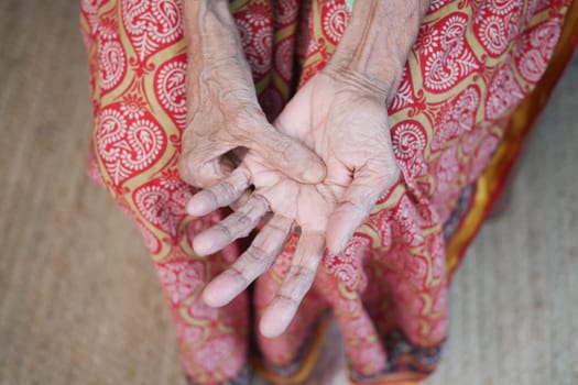 Elderly woman suffering from pain