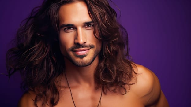 Portrait of an elegant sexy smiling Latino man with perfect skin and long hair, on a purple background. Advertising of cosmetic products, spa treatments shampoos and hair care products, dentistry and medicine, perfumes and cosmetology for men