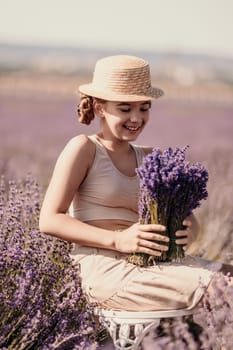 A woman is sitting in a field of lavender flowers and wearing a straw hat. She is smiling and holding a bouquet of flowers. Scene is peaceful and serene, as the woman is surrounded by the beauty of nature.