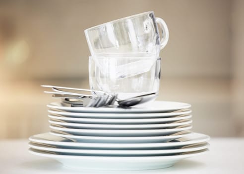 Stack, clean dishes and cups with cutlery for catering, household and tableware for dinner meal at home. Kitchen, dining room or restaurant with ceramic kitchenware for food with luxury serving.