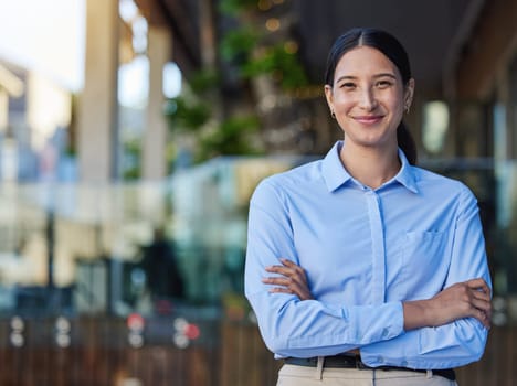 Business portrait, woman and restaurant owner with arms crossed at entrance for startup, service or confidence. Entrepreneur, face and girl at cafe with career, goal and pride for coffee shop success.