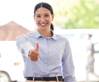 Business woman, thumbs up and portrait with feedback, review and thank you for agreement, success or support. Professional excellence, pride and praise with emoji, yes or like with vote in workplace.