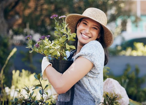 Flower, outdoor garden and portrait of woman with plant for environment, sustainability or ecology. Nature, happiness and female person for green nursery, agriculture or landscaping in backyard.