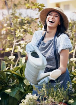 Laughing, water and woman gardening with plants for growth, development and irrigation of agriculture. Happy, funny florist and eco friendly farming for nature, horticulture and floral sustainability.