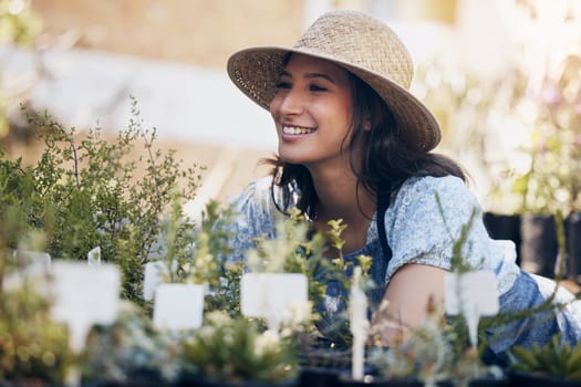 Florist, smile or girl in nature for flowers for growth, ecology development or agriculture business. Happy gardener, nursery or eco friendly farming for plants, horticulture or floral sustainability.