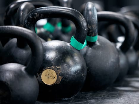 Gym, equipment and kettlebell for exercise, iron and sports for strength. Functional fitness, weight and lifting for strong athlete and training for health and wellness, bodybuilding and gear in club.