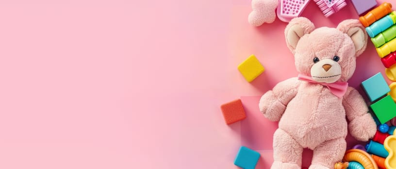 A plush teddy bear with a charming bow, surrounded by a wooden rainbow and multicolored blocks, against a pink canvas