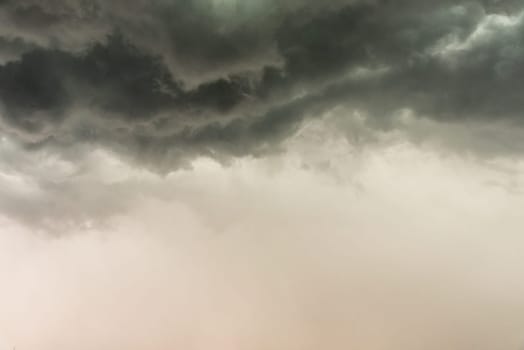 Gloomy clouds have shrouded sky before a thunderstorm.