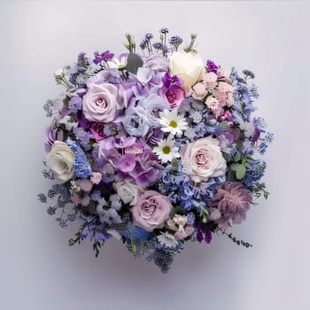 Top view of a bouquet of pink and purple and white flowers. Bright background. Flowering flowers, a symbol of spring, new life. A joyful time of nature waking up to life.