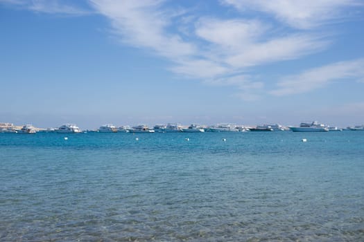 Beach Relaxation at the Red Sea. Fairy-tale Moments of a Sunny Day. The concept of tourism and sea travel.