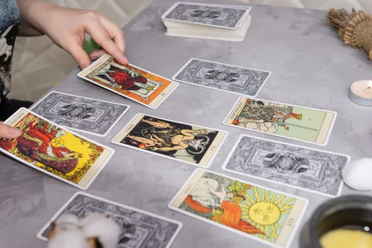 TVER, RUSSIA - FEBRUARY 18, 2024. Tarot cards, Tarot card divination, fortune telling. Occultism, esoteric education