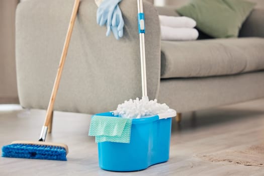 Broom, mop or supplies for cleaning in home maintenance for germ protection, bacteria or safety. Background, cloth or housekeeping tools on dirty floor ready to begin or start chores in apartment.