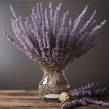 Lavender flowers in a vase on a wooden table and dark background. Flowering flowers, a symbol of spring, new life. A joyful time of nature awakening to life.