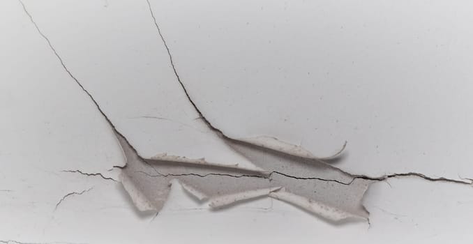 Old cracked plaster wall surface for background or texture