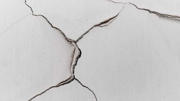 Old cracked plaster wall surface for background or texture