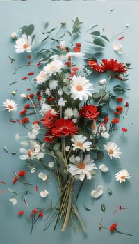 White and red flowers bouquet on a light background. Flowering flowers, a symbol of spring, new life. A joyful time of nature awakening to life.