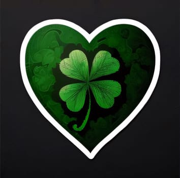 Four-leaf clover in green heart with white frame on dark background. Green four-leaf clover symbol of St. Patrick's Day. A joyous time of celebration in the green color.