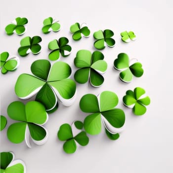 White background, decorated, green earrings, spaces for your own content. Green four-leaf clover symbol of St. Patrick's Day. Happy time of celebration in green color.