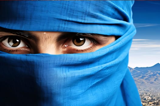 The eyes of a woman in a blue niqab. Ramadan as a time of fasting and prayer for Muslims. A time to meet with Allah.