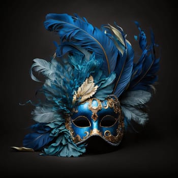 Eye mask with gold ornaments and blue feathers on black background. Carnival outfits, masks and decorations. A time of fun and celebration before the fast.