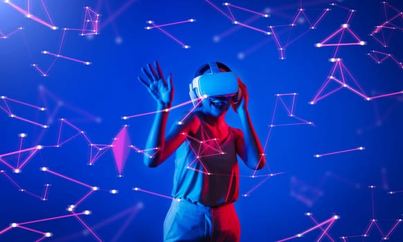 Female standing wearing white VR headset and tank top connecting metaverse, future cyberspace community technology, enjoy dancing in cyberpunk neon light gesticulate hand and body. Hallucination.