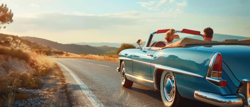 A blue convertible car is driving down a road with a couple of people in the back seat. Scene is relaxed and carefree, as the people are enjoying their time together on a leisurely drive