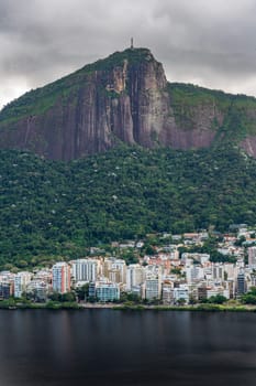 Iconic Rio de Janeiro scene with Christ the Redeemer overlooking Lagoa from a peak.