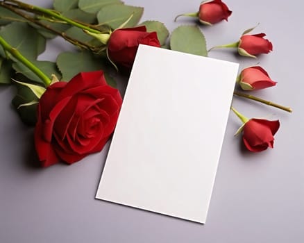 White blank card with space for your own content. Red bouquet of roses, light background. Valentine's Day as a day symbol of affection and love. A time of falling in love and love.