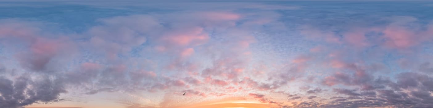 Bright sunset sky panorama with Cirrus clouds. Seamless hdr spherical equirectangular 360 panorama. Sky dome or zenith for 3D visualization, game and sky replacement for aerial drone 360 panoramas.