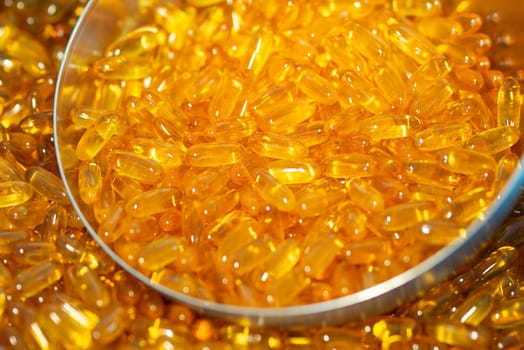 Pile of capsules Omega 3. Close up, top view, high resolution product. High quality photo