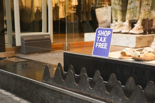 shop tax free text duty free shop sign on shop window ,