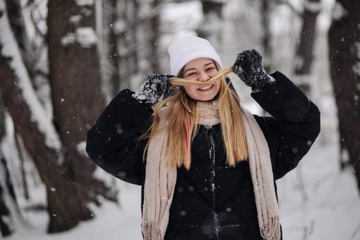 Cute positive portrait of best friend pretty young girls, winter time, neon hats, cozy sweaters, hugs and having fun, natural glowing makeup, two sisters sending air kiss, joy, couple, emotions.