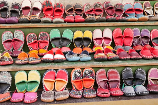 Hand-made baby shoes in istanbul .