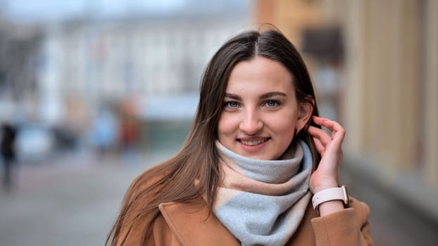 girl portrait in winter on a city street