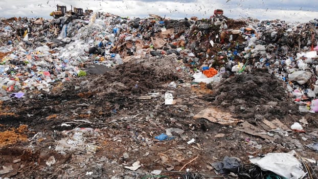 Large landfill near the metropolis in autumn