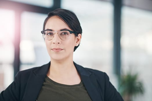 Business, portrait and glasses by woman in office with confidence and pride or consulting, guide and service with lens flare. Face, consultant or broker ready with loan, insurance or property advice.