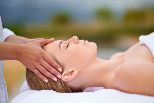 Woman, face and hands with massage in spa for luxury skincare, wellness and relax. Facial care, masseuse and dermatology outdoor with peace, detox treatment and cosmetic therapy for salon aesthetic.