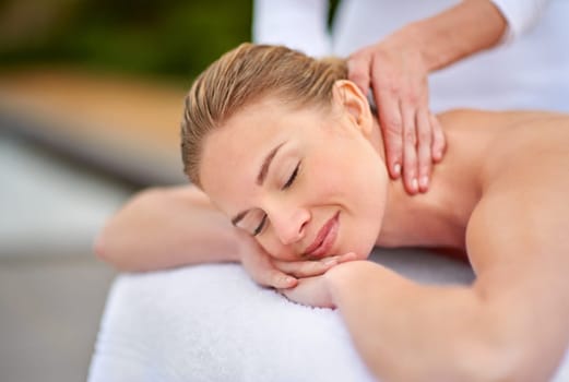 Neck massage, woman and spa with relax, wellness and enjoy or aromatherapy, self care and stress relief. Happy, grooming and zen for treatment, masseuse and luxury with hands, detox and body pamper.