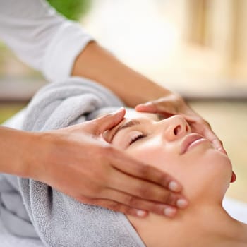 Woman, hands and face with masseuse in spa for luxury skincare, wellness and relax. Facial care, massage and dermatology outdoor for peace, glow treatment and cosmetic therapy with salon aesthetic.