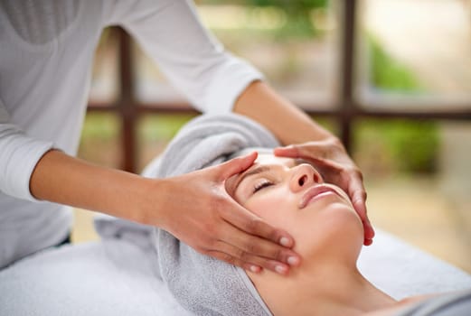 Woman, face and hands outdoor with massage for luxury skincare, wellness and relax. Facial care, masseuse and dermatology in spa with peace, salon aesthetic and cosmetic therapy for detox treatment.