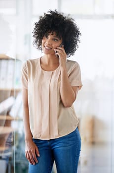 African woman, phone call and smile in office for solution, thinking or networking at startup. Person, employee and smartphone for contact, negotiation or talk to client for deal at creative agency.