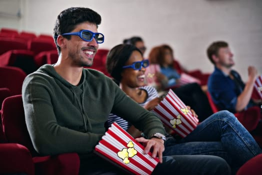 3d, movie and couple in cinema on date with popcorn to relax and watch in theatre with happiness. Film, experience and people in audience with glasses enjoy funny comedy and eating snack or food.