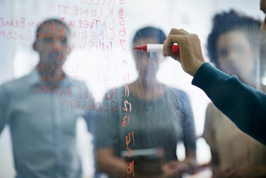 Man, glass and presentation in office with numbers for business figures or metrics, insights and company growth. Team, work and strategy on wall for performance management or profitability in finance.