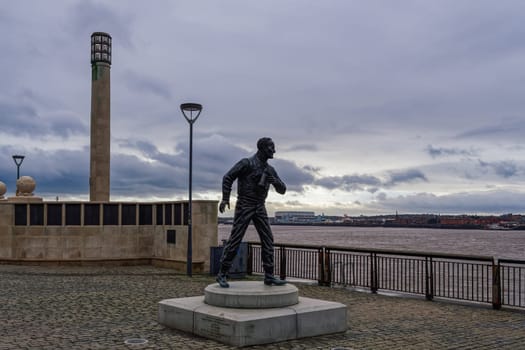 Liverpool, UK - February 21 2020: Sculpture of Captain Frederic Johnnie Walker at the Pier Head on River Mersey waterfront.
