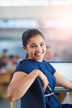 Happy, confident and portrait of business woman with laptop in office for online finance research. Smile, pride and female financial advisor with computer for corporate budget planning in workplace