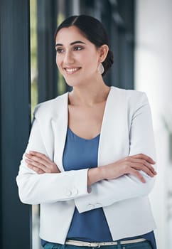 Business woman, window and thinking in office for ideas, inspiration and opportunity in human resources. Professional worker, employee or person with arms crossed and confidence for company solution.