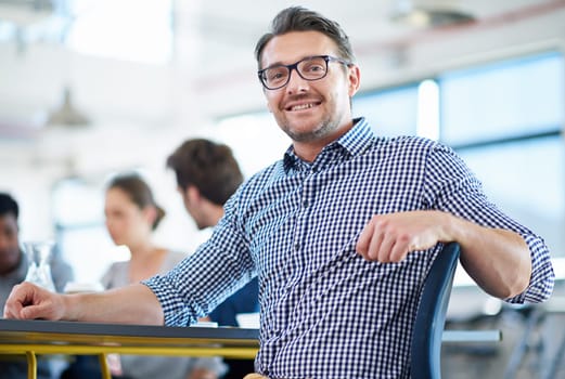 Businessman, portrait and office for meeting, teamwork and planning for creative startup with collaboration. Man, colleagues and web designer with glasses, confidence and growth or development.