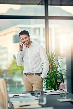 Happy, businessman and phone call in boardroom for connection, networking and communication. Smile, male person or employee with smartphone for discussion, contact and conversation with lens flare.